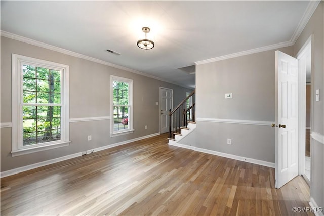 4605 Kingsrow Ct, Glen Allen, VA 23060 - spare room featuring light wood-style floors, healthy amount of natural light, stairs, and crown molding