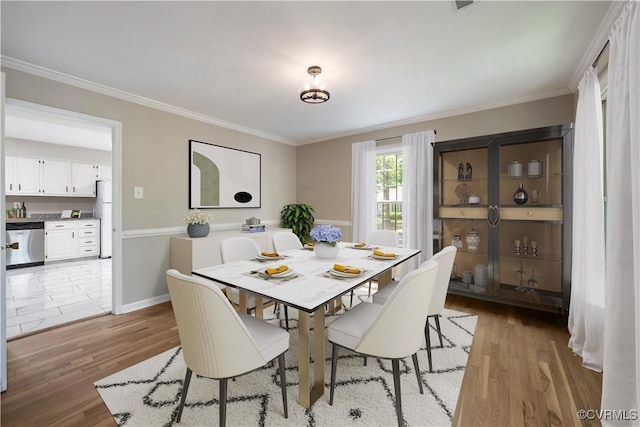 4605 Kingsrow Ct, Glen Allen, VA 23060 - dining space featuring light wood finished floors and ornamental molding