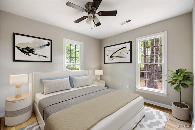 4605 Kingsrow Ct, Glen Allen, VA 23060 - bedroom with wood finished floors and a ceiling fan