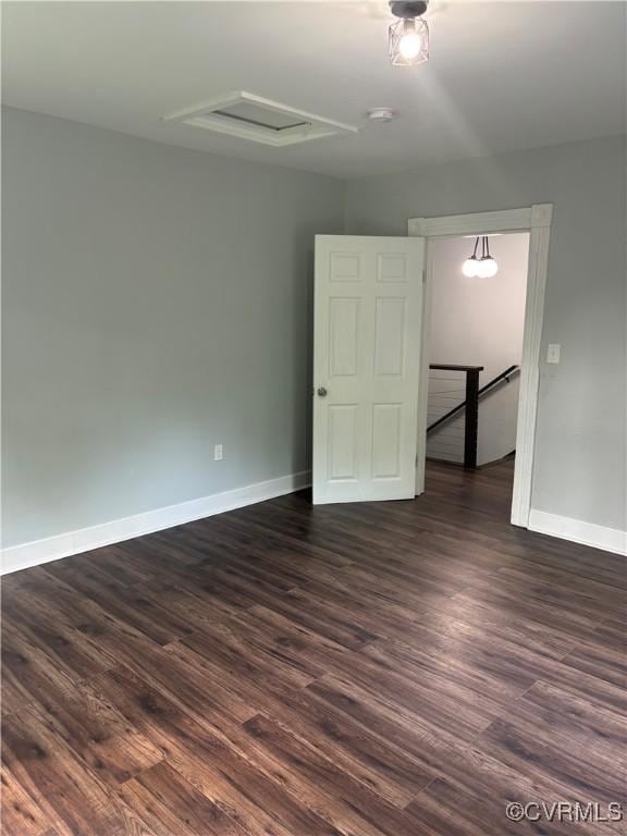 924 Lee Ave, Petersburg, VA 23803 - spare room with dark wood-type flooring, attic access, and a smoke detector