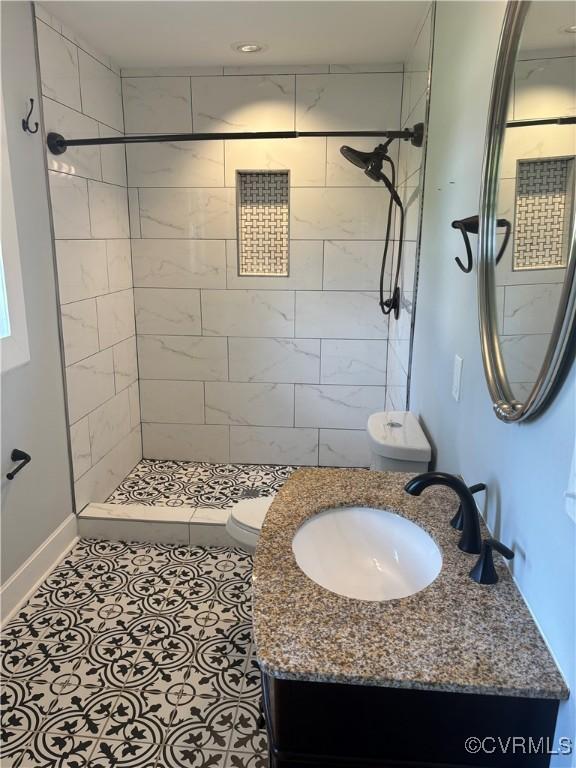 924 Lee Ave, Petersburg, VA 23803 - full bath featuring vanity, a stall shower, and tile patterned floors