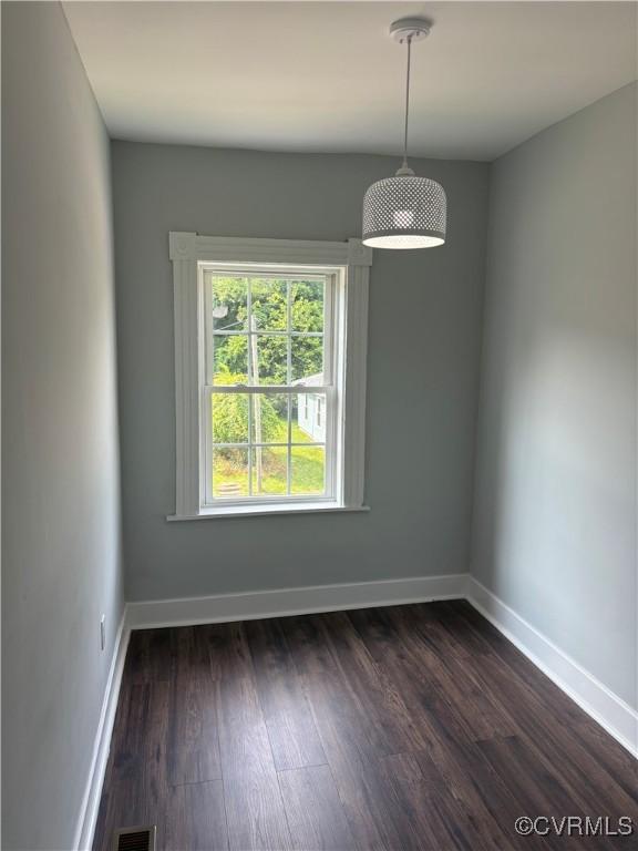 924 Lee Ave, Petersburg, VA 23803 - unfurnished room with dark wood-style flooring and baseboards