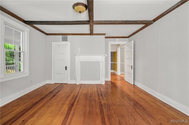 2644 Dorrell Rd, Aylett, VA 23009 - unfurnished room with beamed ceiling, wood finished floors, and ornamental molding