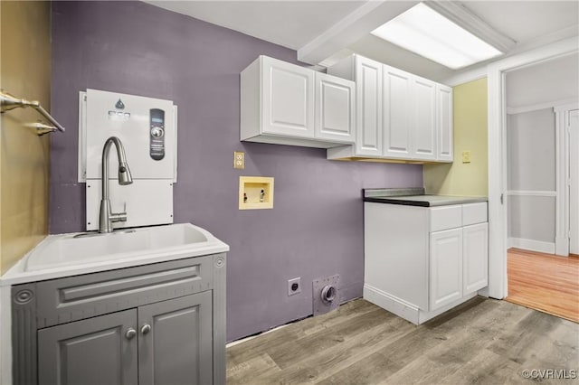 2644 Dorrell Rd, Aylett, VA 23009 - washroom with cabinet space, washer hookup, hookup for an electric dryer, and light wood finished floors
