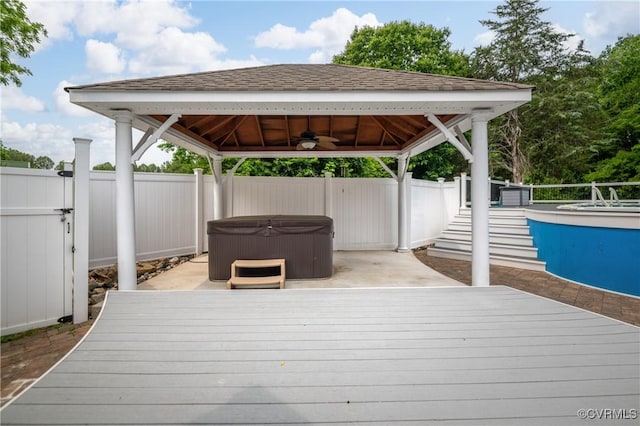 2644 Dorrell Rd, Aylett, VA 23009 - wooden deck featuring a gazebo, a hot tub, a fenced backyard, and ceiling fan