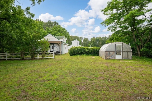 2644 Dorrell Rd, Aylett, VA 23009 - view of yard featuring a greenhouse and an outbuilding
