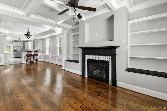 2805 Griffin Ave, Richmond, VA 23222 - unfurnished living room featuring a tile fireplace, crown molding, healthy amount of natural light, built in shelves, and a ceiling fan