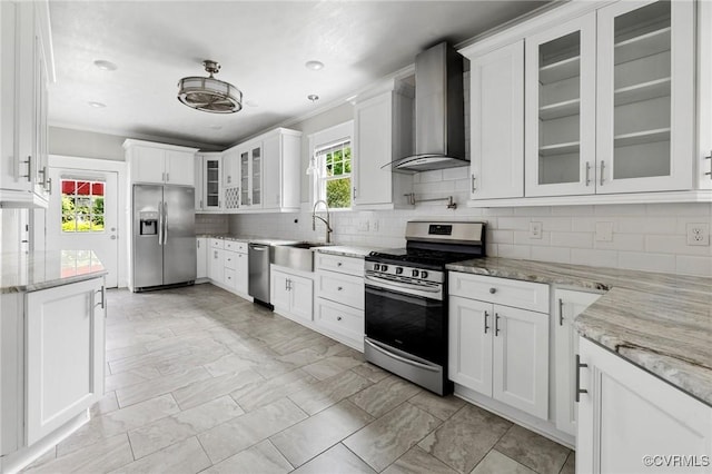 2805 Griffin Ave, Richmond, VA 23222 - kitchen with appliances with stainless steel finishes, wall chimney range hood, decorative backsplash, white cabinetry, and crown molding