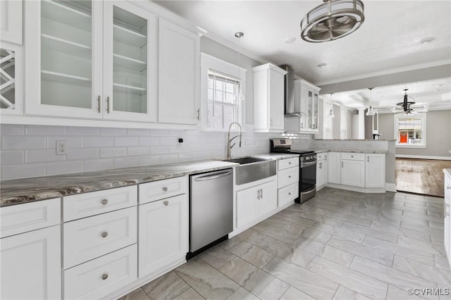 2805 Griffin Ave, Richmond, VA 23222 - kitchen featuring stainless steel appliances, a peninsula, wall chimney exhaust hood, white cabinets, and ornamental molding