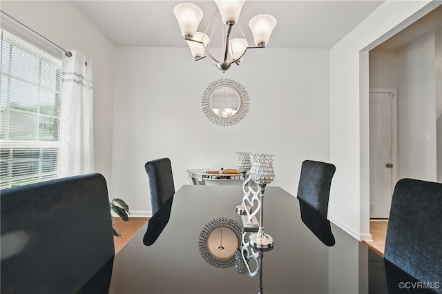 9206 Clovis St, Chesterfield, VA 23237 - dining area with a chandelier and wood finished floors