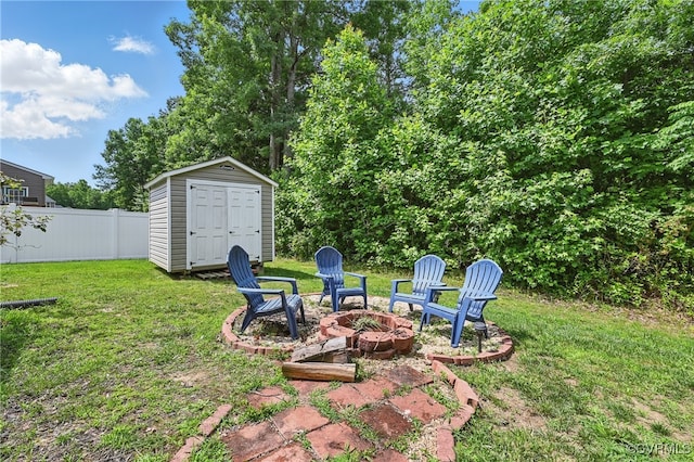 9206 Clovis St, Chesterfield, VA 23237 - view of yard featuring a storage shed and a fire pit