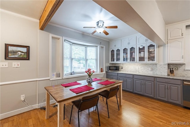 5013 Caledonia Rd, Richmond, VA 23225 - dining space with light wood-type flooring, ceiling fan, and ornamental molding