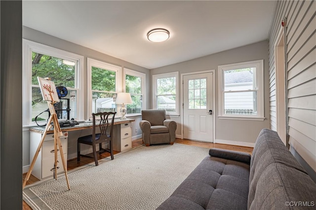 5013 Caledonia Rd, Richmond, VA 23225 - home office with healthy amount of natural light and wood finished floors