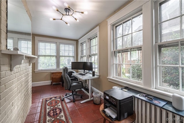 5013 Caledonia Rd, Richmond, VA 23225 - office space featuring dark tile patterned floors and a chandelier