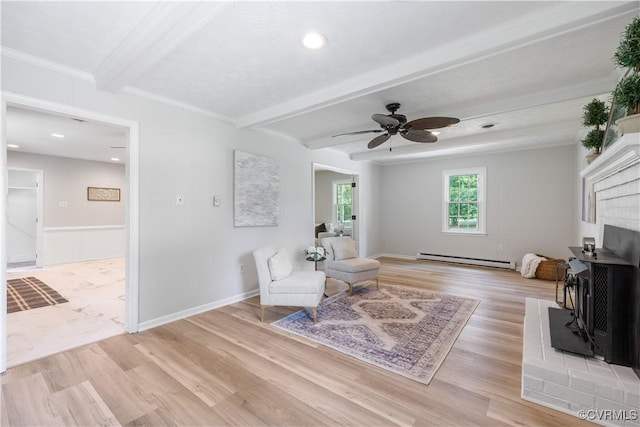 14410 Ranger Rd, Chesterfield, VA 23838 - living area with a baseboard heating unit, beamed ceiling, a ceiling fan, light wood-style flooring, and a wood stove
