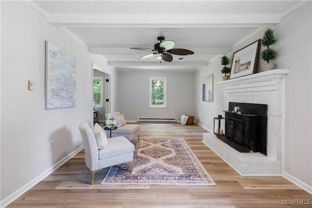 14410 Ranger Rd, Chesterfield, VA 23838 - living area with baseboard heating, beam ceiling, ceiling fan, light wood-style flooring, and crown molding