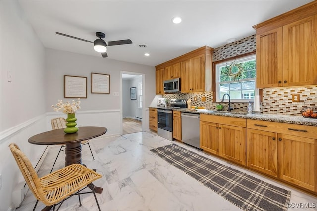 14410 Ranger Rd, Chesterfield, VA 23838 - kitchen featuring appliances with stainless steel finishes, backsplash, ceiling fan, light stone counters, and recessed lighting