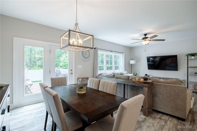 100 Heron Run Dr, Colonial Heights, VA 23834 - dining space with light wood finished floors, a chandelier, and a ceiling fan