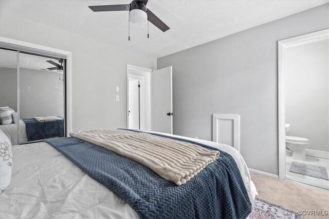 5908 Meadwood Cir, Chesterfield, VA 23234 - carpeted bedroom with connected bathroom, a closet, and a ceiling fan