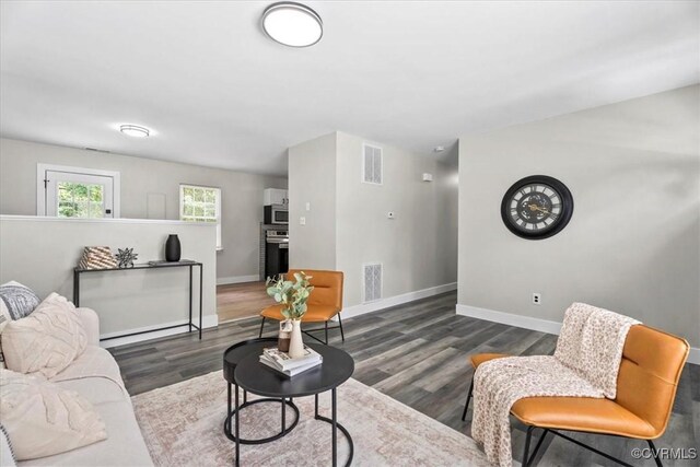 5908 Meadwood Cir, Chesterfield, VA 23234 - living room featuring baseboards and wood finished floors