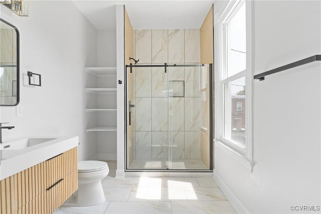 2013 N Ave, Richmond, VA 23222 - bathroom with marble finish floors, vanity, and a stall shower