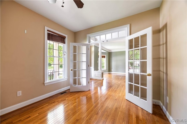 706 Colony Oak Ln, Midlothian, VA 23114 - entryway with french doors, hardwood / wood-style floors, decorative columns, and ceiling fan