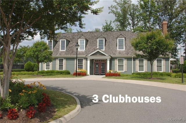 706 Colony Oak Ln, Midlothian, VA 23114 - cape cod-style house with french doors and a chimney