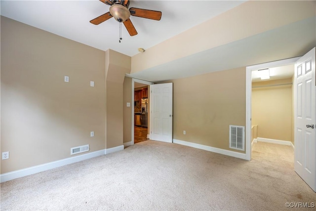 706 Colony Oak Ln, Midlothian, VA 23114 - unfurnished bedroom with carpet floors, a walk in closet, a closet, and a ceiling fan