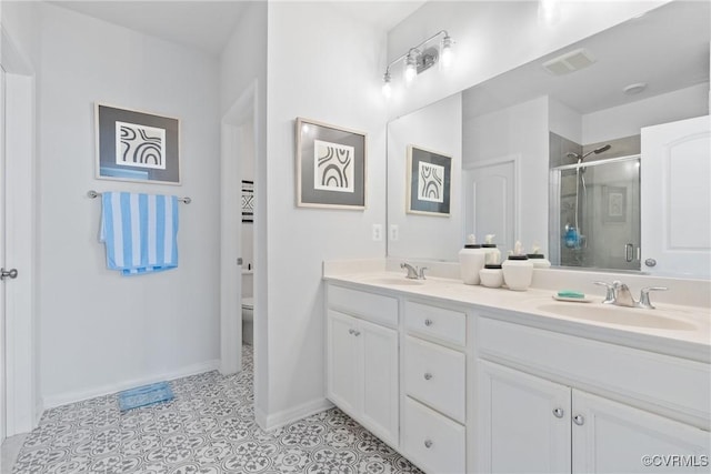 8034 Wistar Glen Dr Unit A, Henrico, VA 23228 - bathroom featuring double vanity, a shower stall, and tile patterned flooring