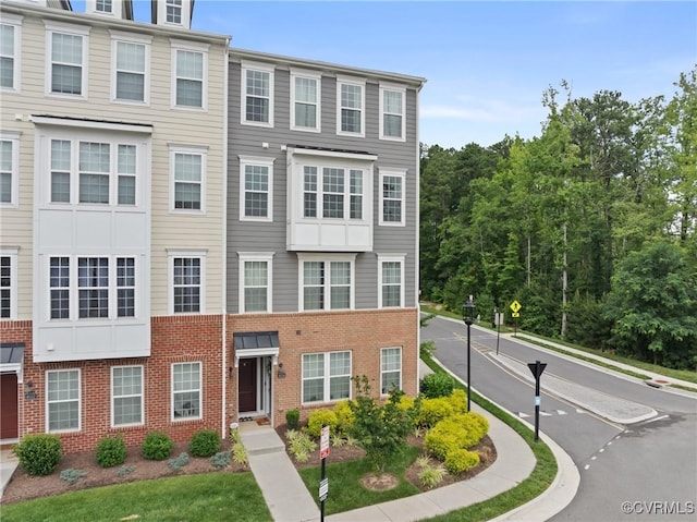 8034 Wistar Glen Dr Unit A, Henrico, VA 23228 - townhome / multi-family property featuring brick siding