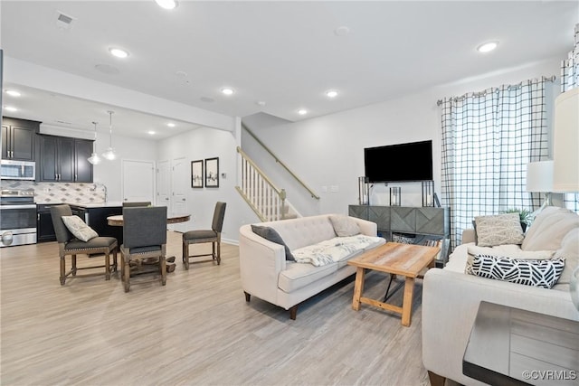 8034 Wistar Glen Dr Unit A, Henrico, VA 23228 - living room featuring stairway, light wood-style flooring, and recessed lighting