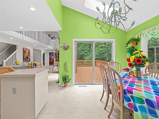 1203 Wesanne Ln, Chesterfield, VA 23114 - dining space featuring high vaulted ceiling, a chandelier, stairway, and recessed lighting