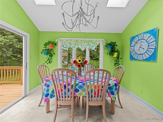 1203 Wesanne Ln, Chesterfield, VA 23114 - dining room with a skylight, lofted ceiling, a chandelier, and light tile patterned floors