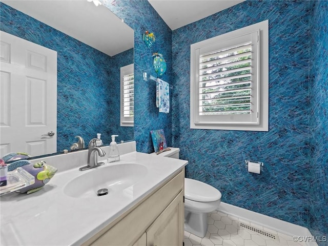 1203 Wesanne Ln, Chesterfield, VA 23114 - bathroom featuring tile patterned floors, vanity, and wallpapered walls
