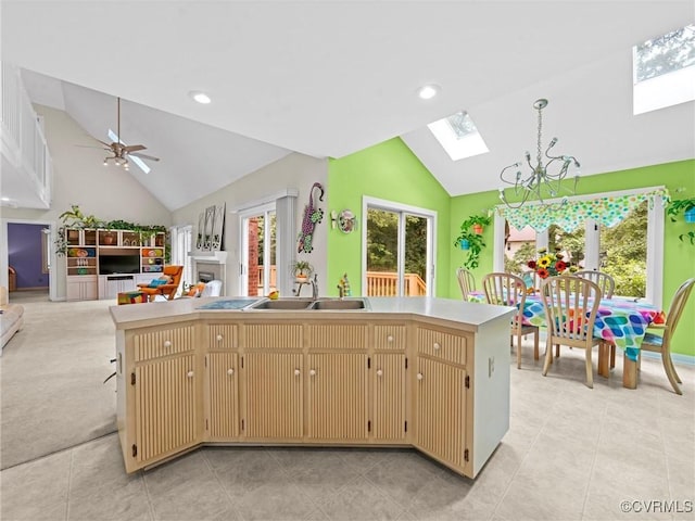 1203 Wesanne Ln, Chesterfield, VA 23114 - kitchen with a skylight, high vaulted ceiling, open floor plan, light countertops, and ceiling fan
