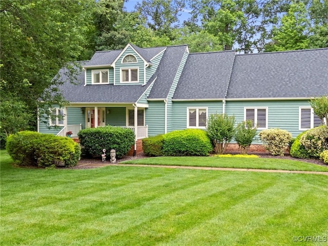 1203 Wesanne Ln, Chesterfield, VA 23114 - view of front facade featuring a front lawn, a shingled roof, and a porch