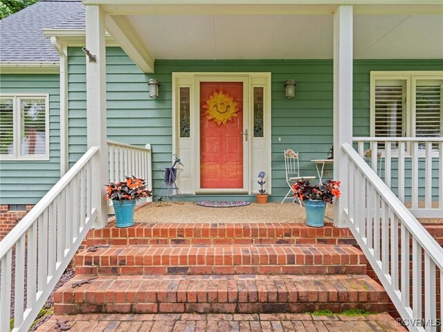 1203 Wesanne Ln, Chesterfield, VA 23114 - doorway to property with a porch and roof with shingles