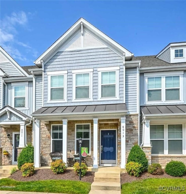 8013 Rutland Village Dr, Mechanicsville, VA 23116 - townhome / multi-family property with a standing seam roof, stone siding, covered porch, and a metal roof
