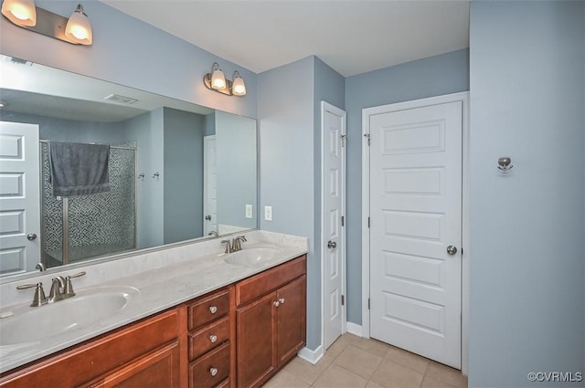 8013 Rutland Village Dr, Mechanicsville, VA 23116 - bathroom with tile patterned floors, double vanity, and a shower