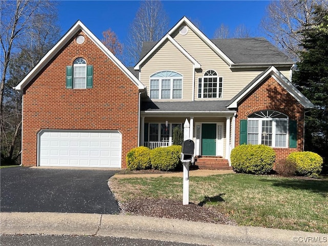 12918 Mill Meadow Ct, Midlothian, VA 23112 - traditional home with brick siding, asphalt driveway, an attached garage, and a front yard