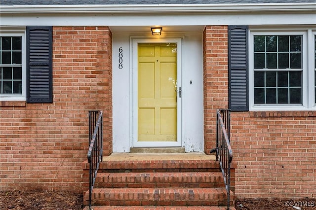 6808 Montauk Dr, Richmond, VA 23225 - property entrance with brick siding and roof with shingles