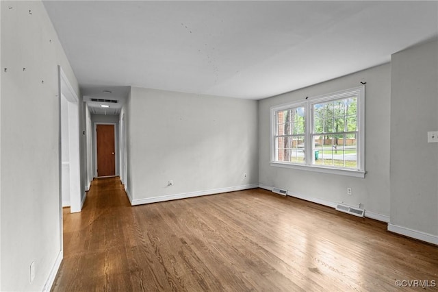 6808 Montauk Dr, Richmond, VA 23225 - unfurnished room featuring wood finished floors and attic access