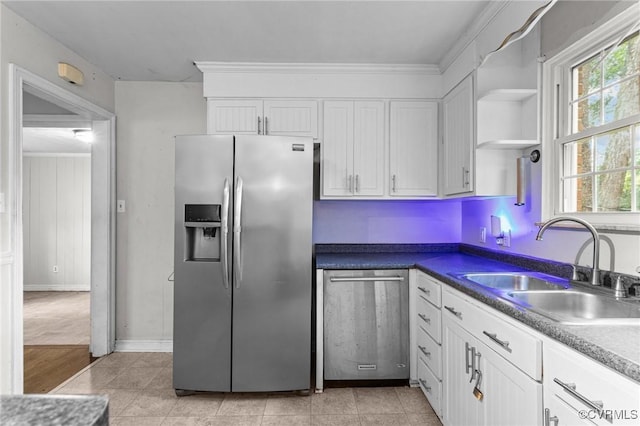 6808 Montauk Dr, Richmond, VA 23225 - kitchen featuring stainless steel appliances, healthy amount of natural light, white cabinetry, and ornamental molding