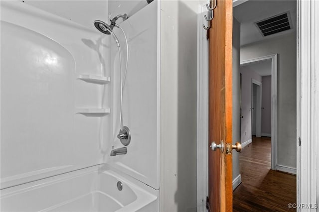 6808 Montauk Dr, Richmond, VA 23225 - full bathroom featuring tub / shower combination and wood finished floors