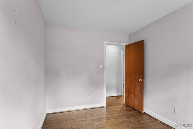 6808 Montauk Dr, Richmond, VA 23225 - empty room featuring baseboards and wood finished floors