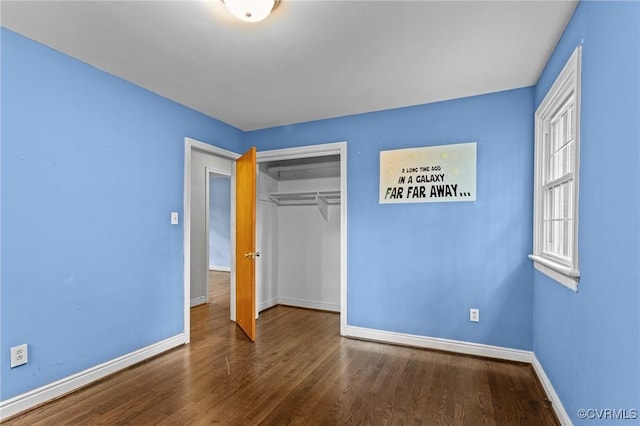 6808 Montauk Dr, Richmond, VA 23225 - unfurnished bedroom with wood finished floors and a closet