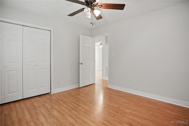 108 N Cedar Ave, Highland Springs, VA 23075 - unfurnished bedroom featuring light wood-style floors, a closet, and a ceiling fan