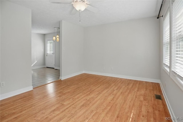 108 N Cedar Ave, Highland Springs, VA 23075 - spare room with light wood-style flooring and ceiling fan