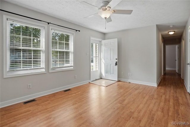 108 N Cedar Ave, Highland Springs, VA 23075 - entryway featuring light wood-style floors, a ceiling fan, and a textured ceiling
