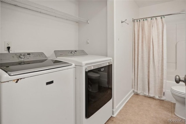 108 N Cedar Ave, Highland Springs, VA 23075 - laundry area featuring independent washer and dryer and light tile patterned floors